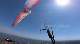 paragliding two wings close approach
