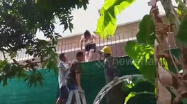 Bangkok grandma rescued after being impaled on railing after balcony fall