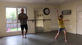 Dad and son jazz dancing together