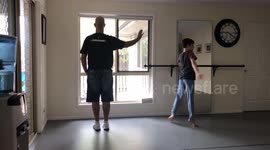 Father and son dance a ballet/lyrical dance together