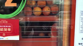 Singapore fresh orange juice vending machine!