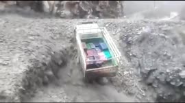Truck gets completely swept away by mudslide in north India