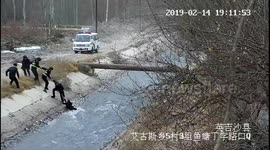 Police in China form human ladder to rescue teen boy washed away in river