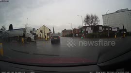 Heart-stopping moment T-boned car spins into lamppost in Stockport, England