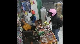 Sleepy shopkeeper dozes through robbery in Indonesia