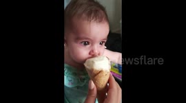 Hungry Aussie baby instantly calms down when eating ice-cream