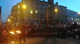 Fire performer at Fire and Ice festival in Market place, Durham, UK