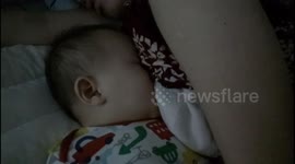 Mom falling asleep with baby while Breastfeeding