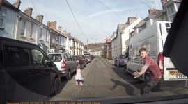 Lucky escape: UK driver's quick reactions save day after little girl walks into road