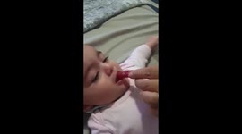 Hungry Aussie baby goes crazy over liquorice