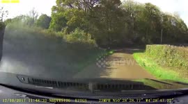 Close Call: Tractor speeding along countryside road almost results in head on collision