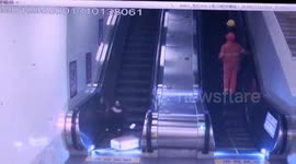 Runaway suitcase knocks down woman on escalator in eastern China