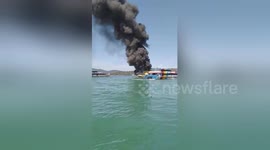 Over 50 passengers rescued from burning ferry in Malaysia