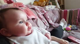 4 month old baby laughing at tv