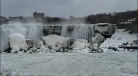 Broken ice from Lake Erie partially blocks Niagara Falls