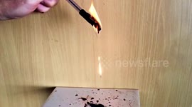 Satisfying footage of burning plastic pen dripping balls of fire