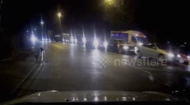 Girls run out into oncoming car