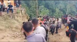 Six killed and dozens still buried in Indonesia mine collapse