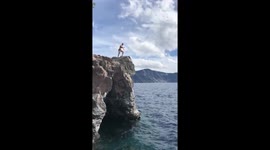 Cliff jumping into freezing water