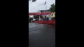 Amateur Cycling Race at the finish line in the rain