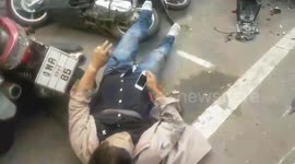 British driver with one arm causes carnage after smashing into parked motorcycles