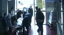 Hospital door falls off when opened, hitting passing woman