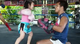 Five-year-old Muay Thai prodigy packs a punch while training with her father