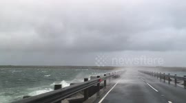 Car hit by wave during storm in the Orkney Isles