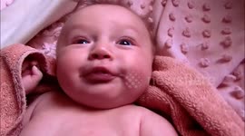 Grandma's little copycat wants to blow raspberries too