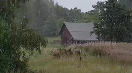 Heavy summer rain pouring down
