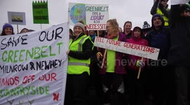 Tandle Hill 'Save the Greenbelt' protesters march against plans to build thousands of homes on greenbelt