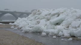 A Tidal Wave Of Ice Crashes Through A Wall And Causes Homes To Flood