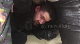 Moment former soldier disarmed gun-wielding robber in corner shop - and pointed gun at his head