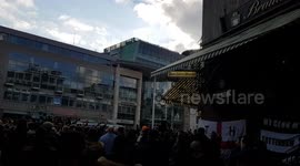 Spurs fans in full voice in the centre of Dortmund ahead of the Tottenham Hotspur v Champions League match