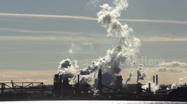 Cold weather hangs on in Ontario Canada, A look at the steam and smoke stacks in Hamilton industrial area