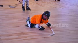 Little boy takes on Roller Hockey