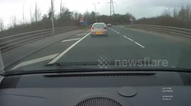 DRIVER DOES A U-TURN ON SLIP ROAD