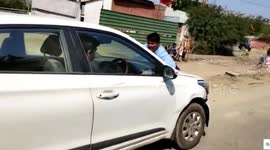 Shocking video shows road rage fight which saw one driver being carried for more than a mile - on a moving car bonnet