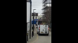 'Dodgy' scaffolders swing metal from building site on windy day