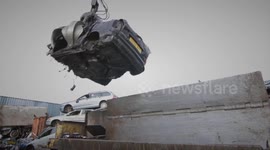 Quick fast-motion shows off how you crush a car