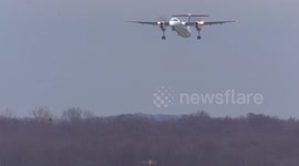 Roller coaster ride! Turboprop planes buffered by high winds in aborted Dusseldorf landing