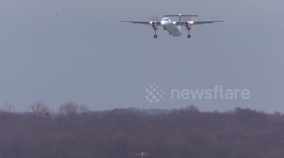 Roller coaster ride! Turboprop planes buffered by high winds in aborted Dusseldorf landing