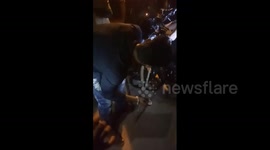 Rescuer struggles to pull out cobra from bike with his bare hands