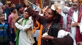 Devotees poke their eyeballs with swords in bizarre Muslim festival