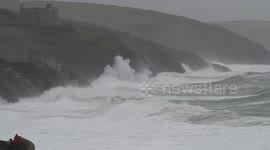 Waves smash UK coast as Storm Gareth tightens its grip