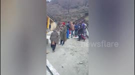 Massive landslide damages 13 shops in Kashmir India.