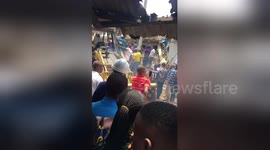 Chaos at scene of collapsed three-storey building in Lagos