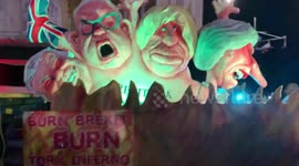 Anti-Brexit float drives past Brexit protesters on “No deal” vote night