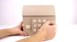 YouTuber creates DIY mechanical safe box from cardboard