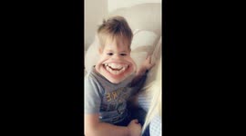 Sons first time using a snapchat filter